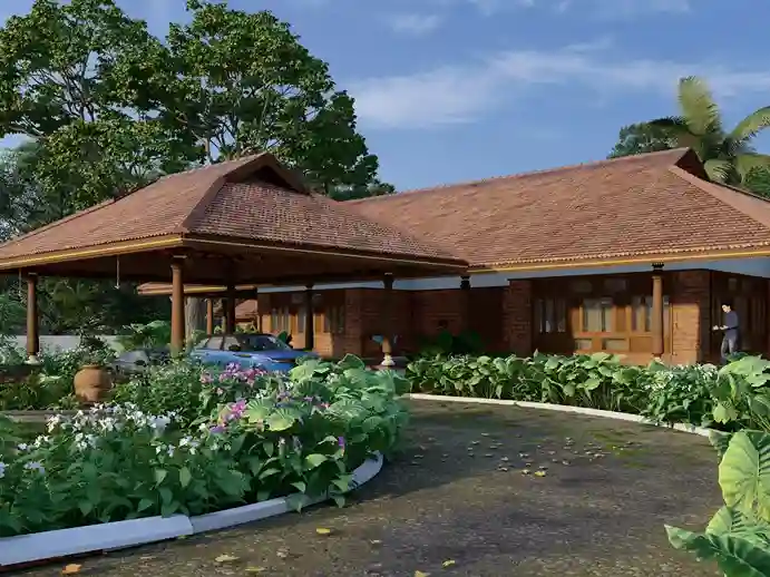 Renovated Kerala home patio with open courtyard design, modern tropical materials, and natural light integration by R+A Architects.