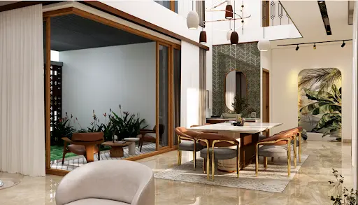 Central open-to-sky patio at Shabeer Ali Residence in Kerala showing natural light, greenery, and seamless indoor-outdoor flow.