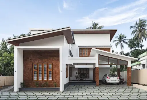 Kerala home interior with natural cross ventilation and open window airflow